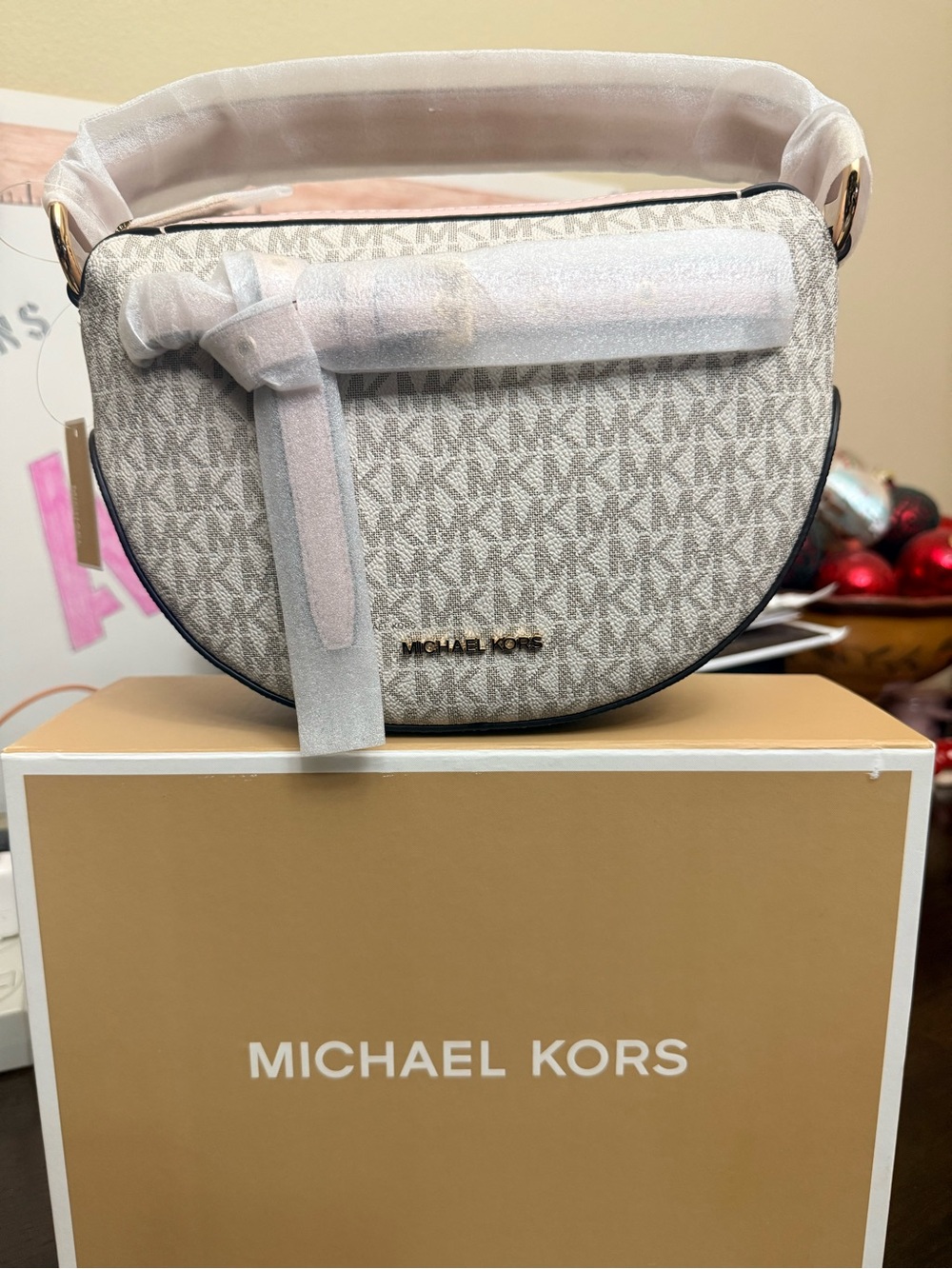 Michael Kors Ivory/Beige MK Logo Mini Saddle Bag with Gold Hardware